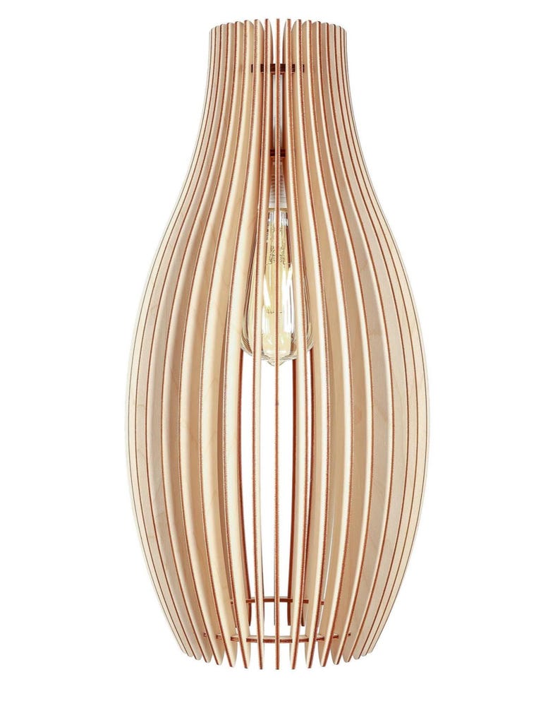 May include: A wooden pendant light fitting with a teardrop shape. The light is made of vertical wooden slats, with a light bulb visible inside. The wood has a natural, light brown colour. The fitting is designed for indoor lighting.