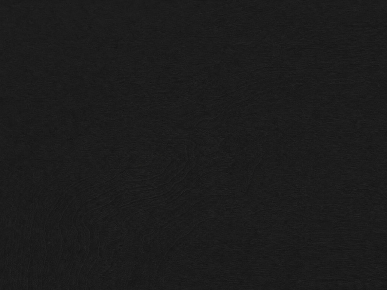 May include: A solid black background featuring a subtle, fine-grained texture throughout the entire surface. The dark, monochromatic appearance displays faint, swirling patterns that create a soft, organic visual depth across the dark field.