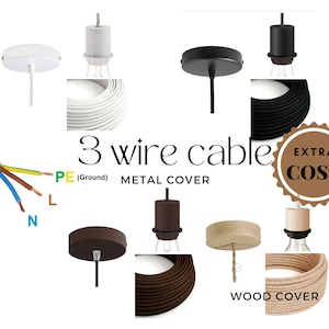May include: A collection of lighting components featuring 3 wire cables, metal ceiling covers in white, black, and brown, and a wood cover. The image displays coiled cables, lamp sockets, and a diagram of a 3-wire cable labeled PE, L, and N.