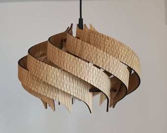 May include: A modern, wooden pendant light fixture with a swirling, layered design. The light is made of multiple pieces of wood that are stacked and curved to create a unique and eye-catching shape.