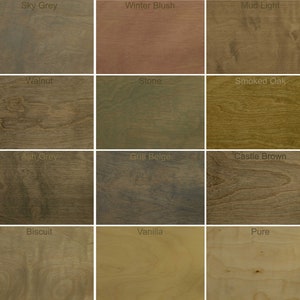 May include: A wood stain color chart with 20 different wood stain colors. The colors are arranged in a grid of four rows and five columns. The colors include Oak, Sky Grey, Winter Blush, Mud Light, Oyster, Emerald, Walnut, Blonde, Smoked Oak, Bourbon, Cinnamon Brown, Night Grey, Coal Beige, Castle Brown, Titanium Grey, Dark Oak, Biscuit, Vanilla, Pure, and Mist.