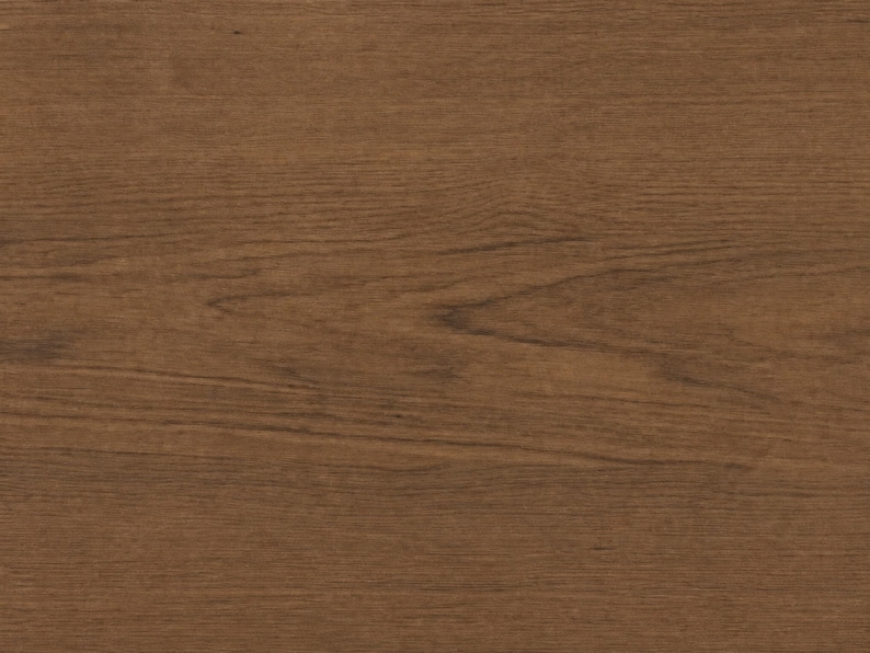 May include: A medium brown wood surface featuring a natural grain pattern with horizontal lines and subtle variations in tone. The texture displays the organic characteristics of timber, showing darker streaks and lighter brown highlights throughout.