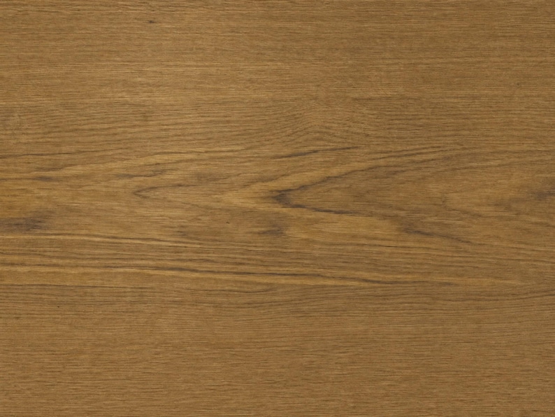 May include: A medium brown wood surface featuring a natural grain pattern with horizontal lines and subtle darker streaks. The texture displays the organic characteristics of timber, showing variations in tone from light tan to deep brown hues.