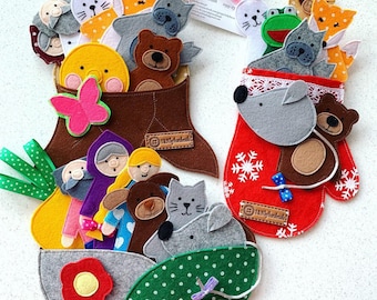Puede incluir: Dos juegos de títeres de dedo de fieltro, uno en una bota marrón y otro en una manopla roja. El juego de la bota incluye un oso, un gato, un conejo, un lobo, una niña y otros personajes. El juego de la manopla incluye un oso, un lobo, un gato y otros personajes. Ambos juegos están hechos a mano y presentan una variedad de colores y texturas.