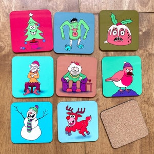 May include: Set of 10 colorful coasters featuring various Christmas-themed illustrations. The coasters are square and made of cork. The illustrations include a Christmas tree, a snowman, a reindeer, a robin, a Christmas pudding, a Christmas elf, a grandma in a Santa hat, and a man in a Christmas sweater.