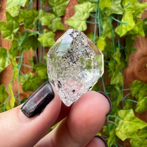 0.41 oz. Large Herkimer Diamond Quartz Crystal with Non Moving Enhydro from Herkimer County NY. 11.7 grams. E11. You get this piece!