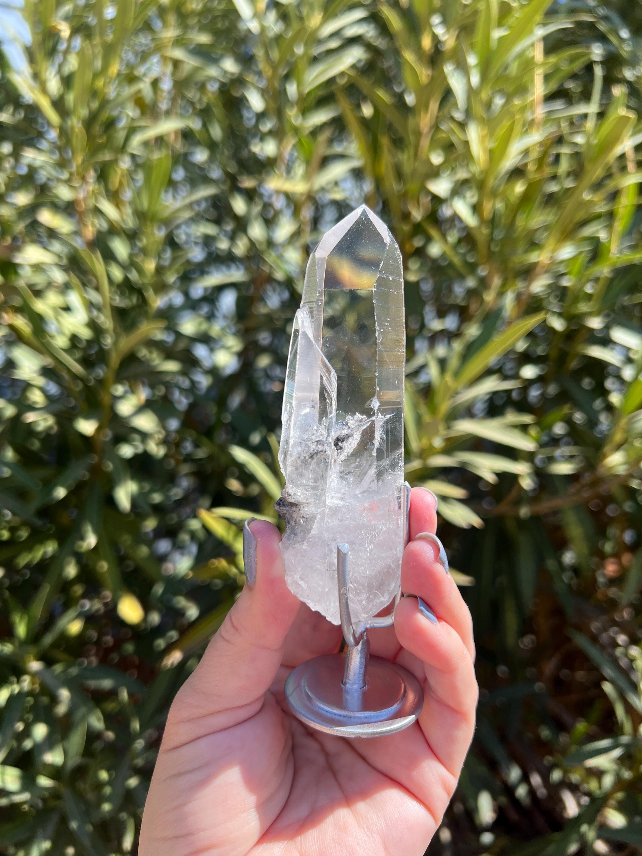 5.36 oz. Super Clear Quartz Point With Phantom & Removable Metal Stand. You get this piece!