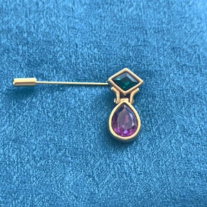 Vintage Swarovski-hoedenspeld jaren 80: zwanenlogo, paars en groen