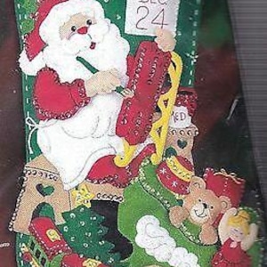 DIY Bucilla Santas speelgoedwinkel Sleetrein kerstavond vilten kousenset
