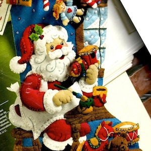 DIY Bucilla Kerstman in de werkplaats Speelgoed vilten kerstsokset