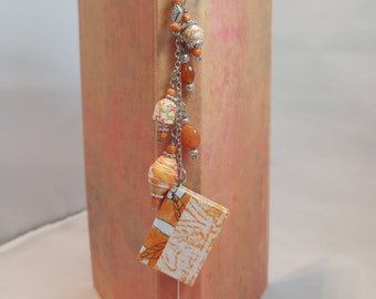 Orange Crayon Rubbing Mini Book Dangle