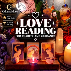 May include: A wooden card holder displaying three tarot cards featuring cat illustrations, positioned behind a lit tea light candle, a small sphere, and a smooth stone. The text reads OdonnaMoon, Etsy Star Seller, 8 years on Etsy, and LOVE READING FOR CLARITY AND GUIDANCE.
