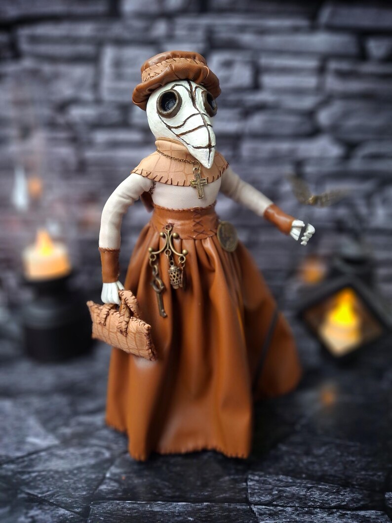 Handmade gothic plague doctor art doll viewed from lower right wide angle, displaying full figure with detailed handcrafted features and dark vintage gothic design.