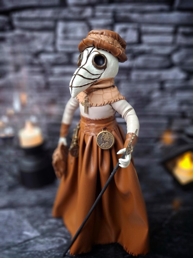 Handmade gothic plague doctor art doll in close-up left view, showcasing detailed handcrafted features and dark vintage gothic design.