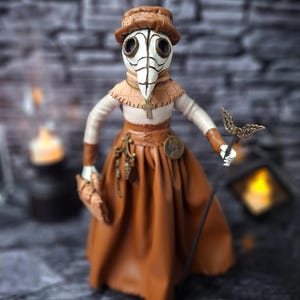 Handmade gothic plague doctor art doll shown from straight front wide view, displaying full figure with handcrafted details and dark vintage gothic design.