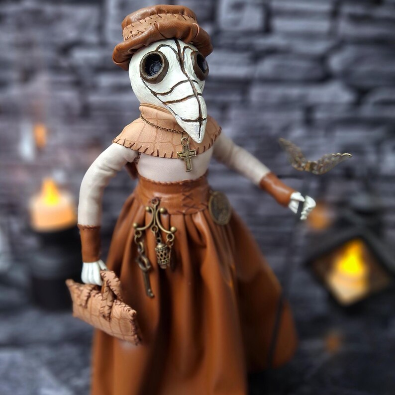 Handmade gothic plague doctor art doll in close-up right view, featuring detailed handcrafted features and dark vintage gothic design.