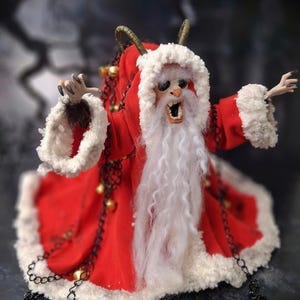 Wide shot of handmade Krampus art doll from right diagonal angle – spooky gothic Christmas collectible showing full figure, detailed sculpting, textures, and dark holiday decor.