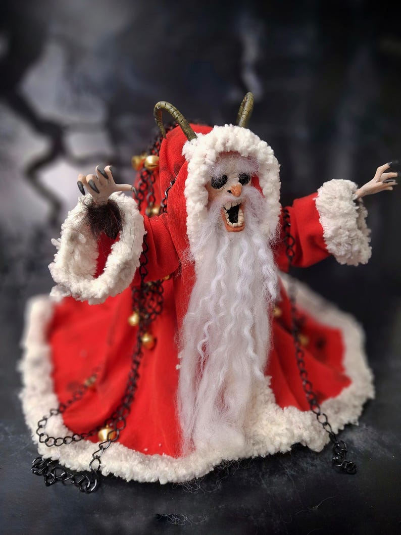 Wide shot of handmade Krampus art doll from right diagonal angle – spooky gothic Christmas collectible showing full figure, detailed sculpting, textures, and dark holiday decor.