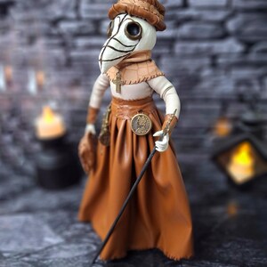 Handmade gothic plague doctor art doll shown from full left wide view, displaying detailed handcrafted features and dark vintage gothic design.