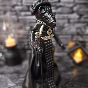 Handmade gothic plague doctor art doll in close-up right view, showing detailed handcrafted features and vintage gothic design for collectible display.
