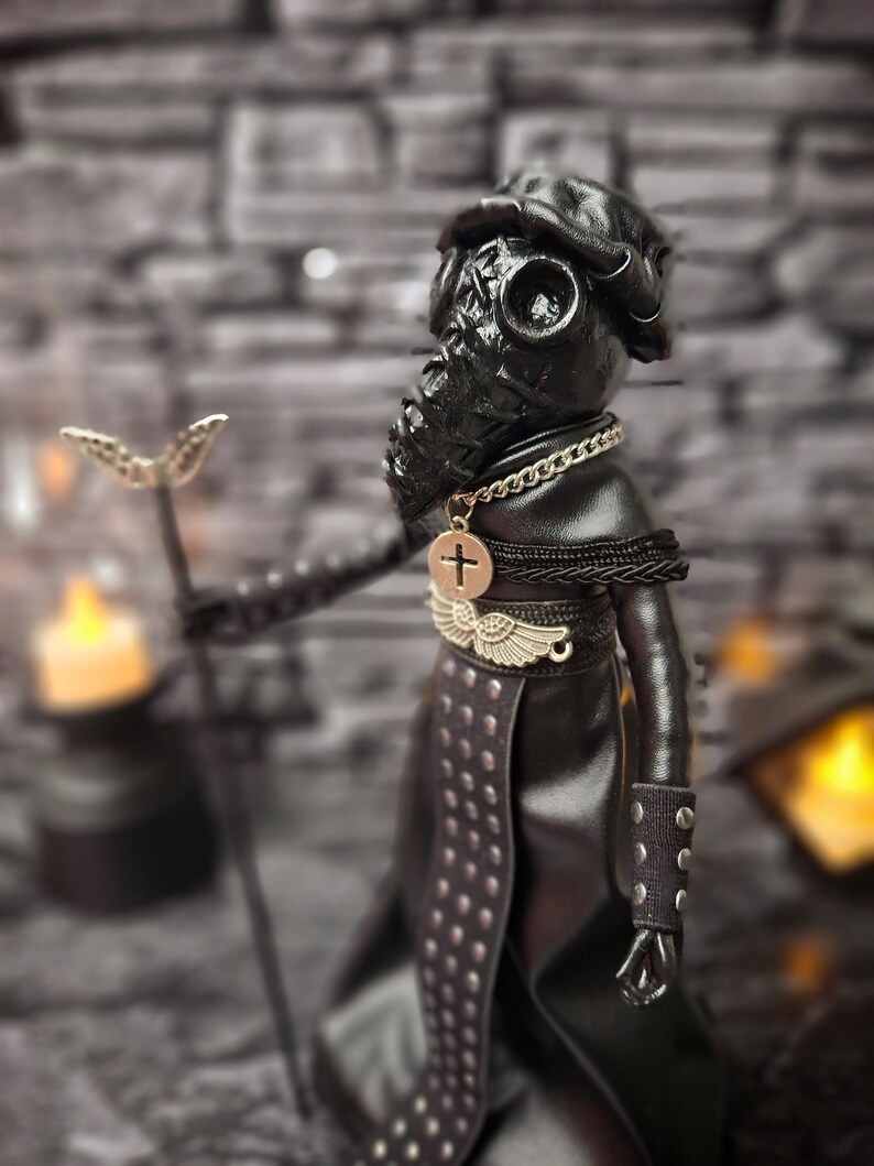 Handmade gothic plague doctor art doll in close-up left view, highlighting handcrafted details and dark vintage design for gothic collectible display.