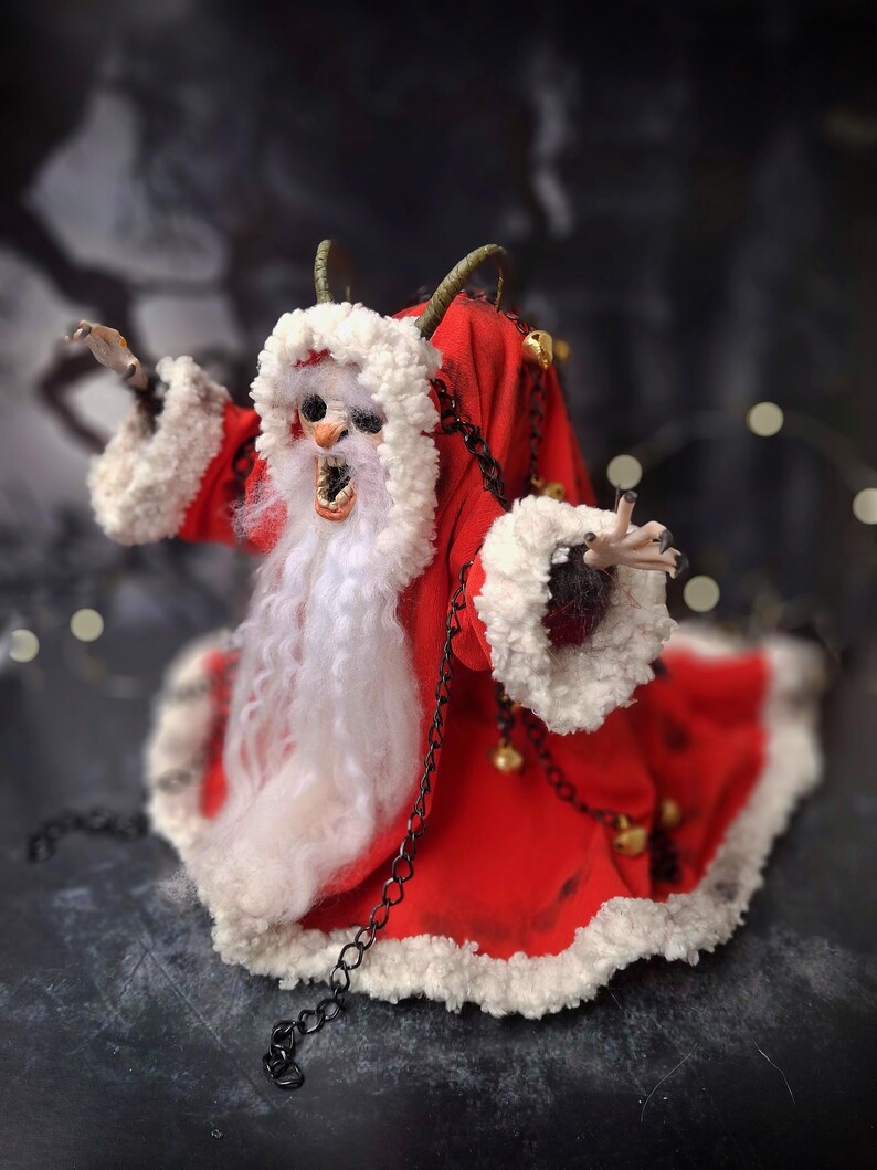 Handmade Krampus art doll from left diagonal angle – spooky gothic Christmas collectible showing detailed sculpting, textures, and dark holiday decor.