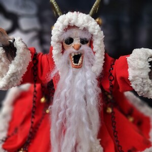 Close-up of handmade Krampus art doll standing straight – spooky gothic Christmas collectible showing detailed sculpting, textures, and dark holiday decor.