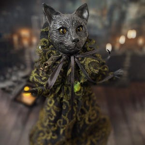 Front-right diagonal view of a handcrafted black cat art doll standing, featuring whimsical gothic design, hand-painted details, and lifelike sculpting, ideal for collectors of spooky cat décor, Halloween displays, gothic home accents, and unique black cat gifts.