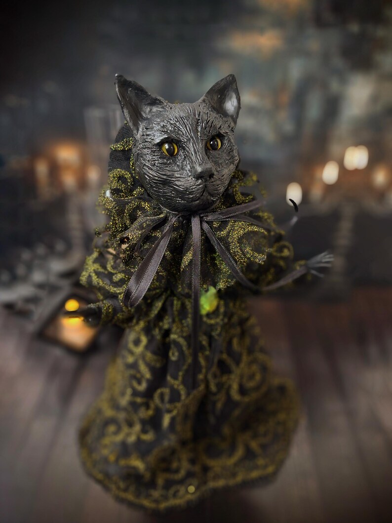 Front-right diagonal view of a handcrafted black cat art doll standing, featuring whimsical gothic design, hand-painted details, and lifelike sculpting, ideal for collectors of spooky cat décor, Halloween displays, gothic home accents, and unique black cat gifts.