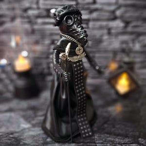 Handmade gothic plague doctor art doll displayed at a right angle view, dark collectible figure with vintage details, handcrafted for gothic home decor display.
