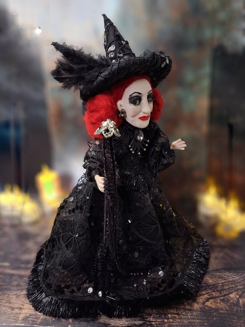 Right side view of the handmade fancy witch art doll, highlighting her hand-painted face, whimsical witch outfit, and enchanting accessories.