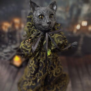 Front-right diagonal view of a handmade black cat doll standing, showing detailed sculpting, hand-painted features, and whimsical gothic design, a unique collectible perfect for black cat lovers, spooky home décor, Halloween displays, and gothic cat art collections.