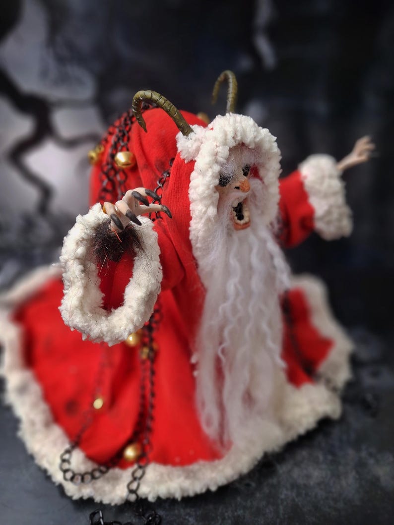 Handmade Krampus art doll viewed from top right diagonal angle – spooky gothic Christmas collectible showing detailed sculpting, textures, and dark holiday decor.