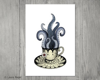 May include: A white teacup with a blue and black octopus rising from it. The teacup has a gold rim and a gold tea bag tag with a red eye.