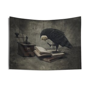 May include: A black bird with a white face is perched on a stack of old books. The bird is looking down at the open book. There is an antique coffee grinder in the background.