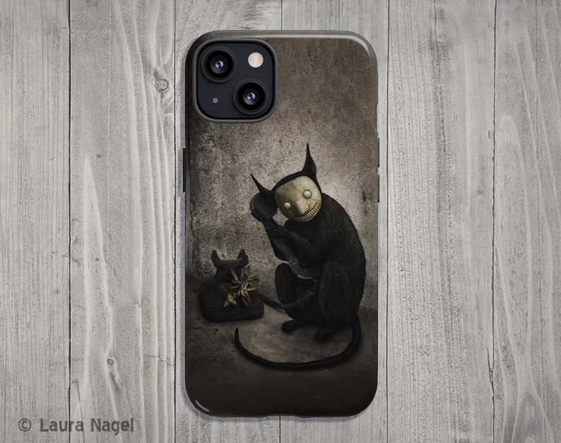 May include: A black phone with a black cat with a creepy smile on its face. The cat is holding the phone to its ear. The background is a dark gray wall.