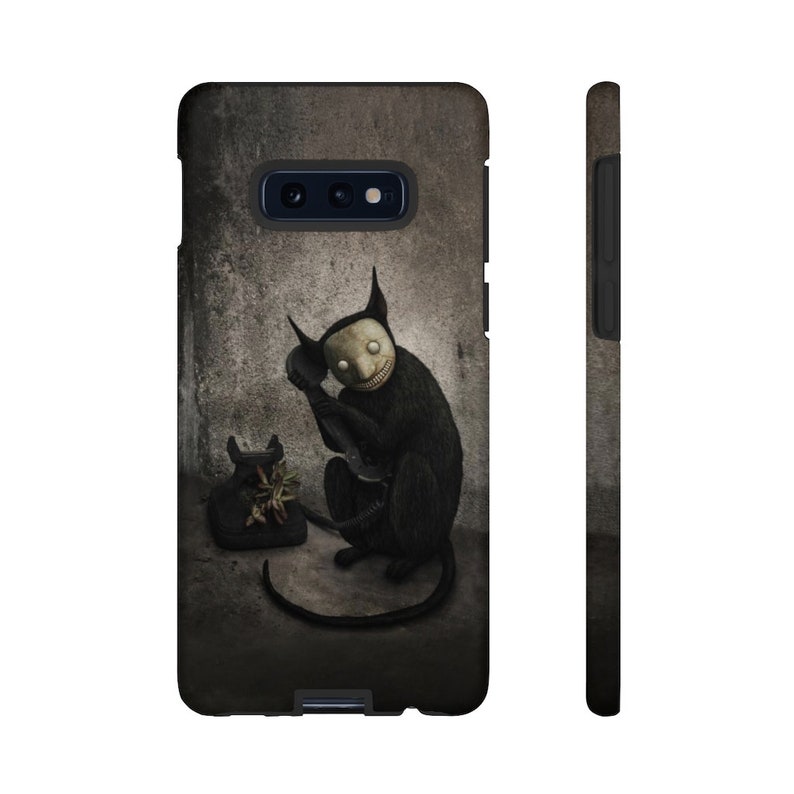 May include: A black and white illustration of a creature with a mask on its face, holding a vintage rotary phone. The creature is sitting on a gray background.