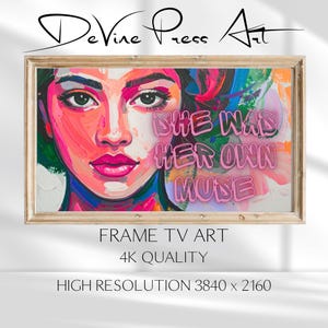 May include: A framed digital art print featuring a vibrant portrait of a woman with pink and red hues. The artwork includes the text "SHE WAS HER OWN MUSE". The frame is a light wood color. The image is labeled "FRAME TV ART" and "4K QUALITY".