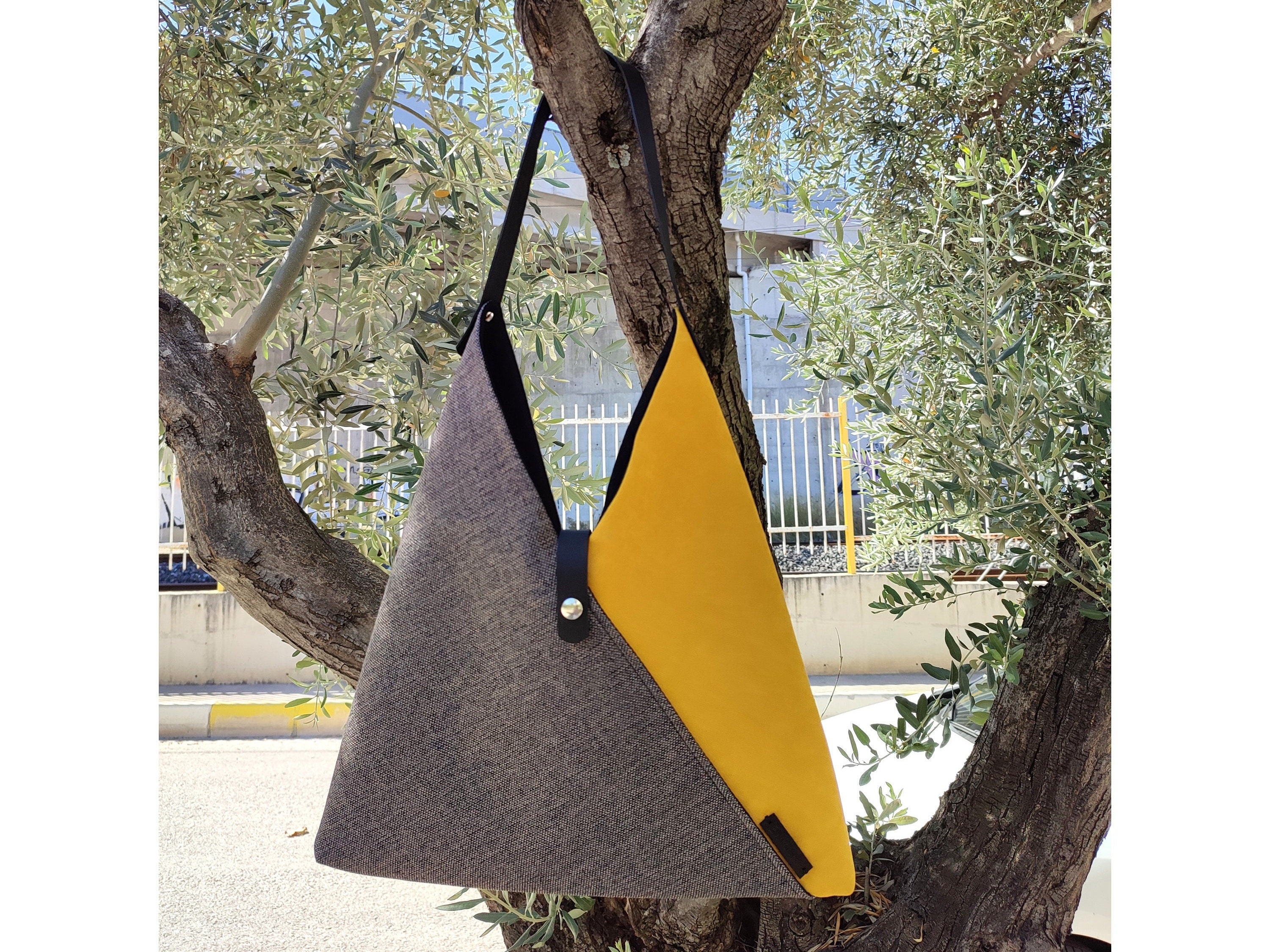 Triangle designer bag hotsell