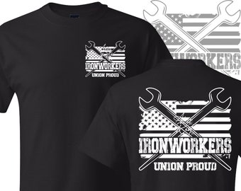 May include: Black t-shirt with a white graphic of two wrenches crossed over a distressed American flag with the text "Ironworkers Union Proud".