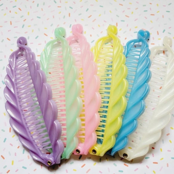 Feather Banana Clips, hinge and hook hair accessory, 1980's