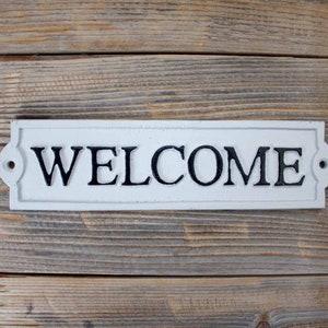 White Cast Iron Welcome Sign