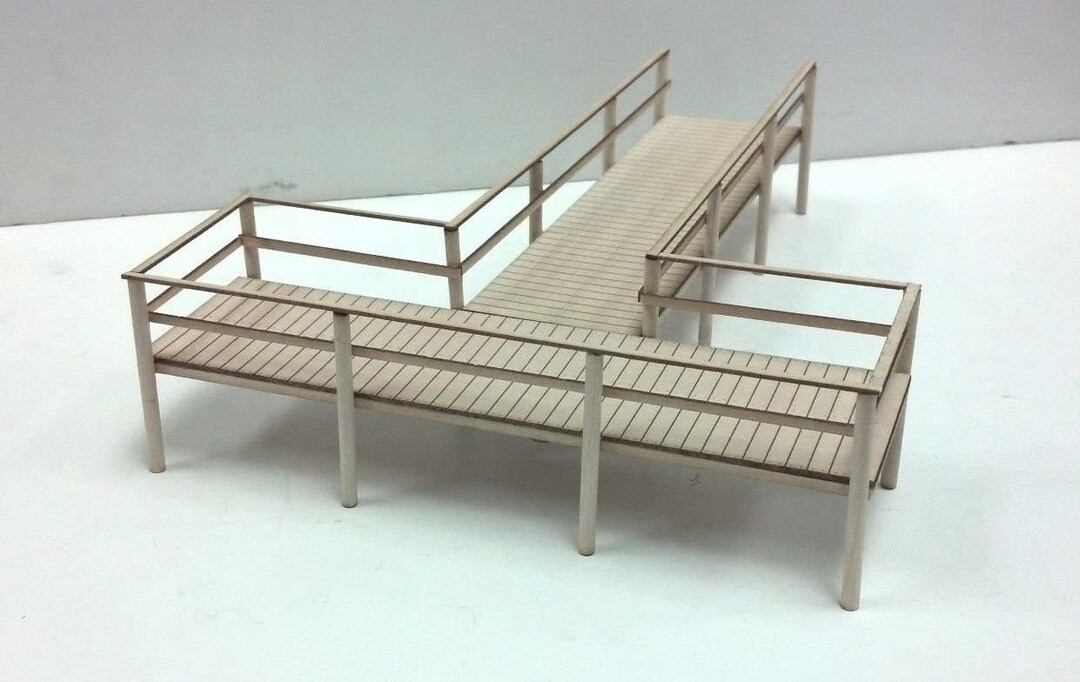 thumbnail interactive-video image 1 of N Scale Laser Cut Jon Boats & Dock Kit – 4 Boats + Dock, Unpainted, Train Time Laser 4143 1 of 2