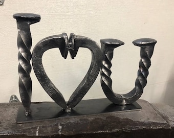 Me encanta el arte de los clavos del ferrocarril U