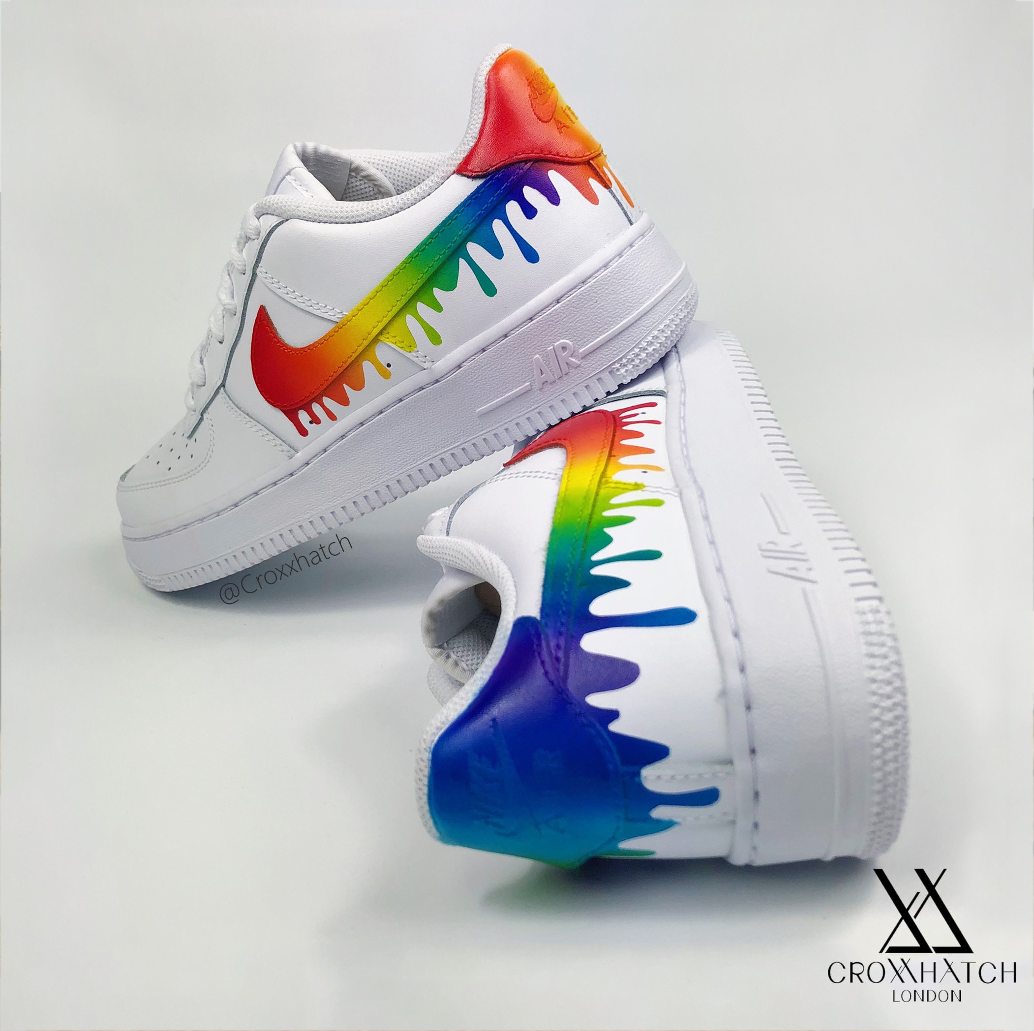 white nike air with rainbow swoosh