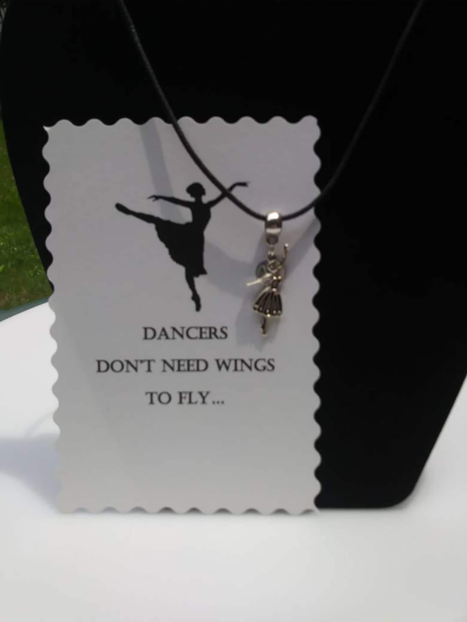 ballet shoes or ballet dancer hung on barrel bead charm holder and hung from silver plated/nickel free ballchain or black cordag