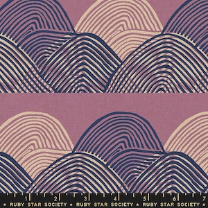 May include: A repeating pattern of stylized hills in shades of purple, beige, and blue. The hills are made up of overlapping lines that create a textured effect. The pattern is on a light purple background.