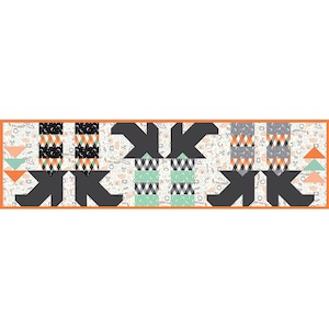 May include: A Halloween-themed quilt runner with a repeating pattern of black, gray, and orange geometric shapes. The runner features a white background with small Halloween-related illustrations and an orange border.