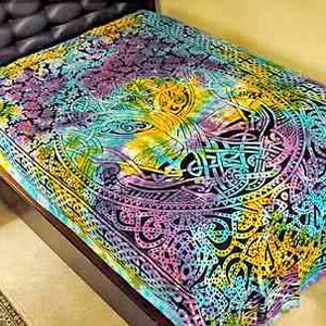 May include: A colorful tapestry with a tie-dye design featuring a Celtic knot pattern in shades of blue, green, yellow, and purple.