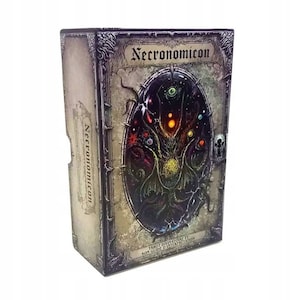 May include: A rectangular box with the title "Necronomicon" in ornate lettering. The front features a dark, detailed illustration of a cosmic entity. The box has a weathered, aged appearance, with text in French at the bottom.